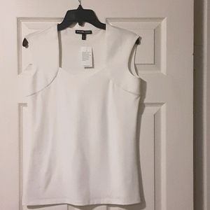 Form fitted white top.